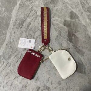 Brand new with tags Lululemon dual pouch keychain
